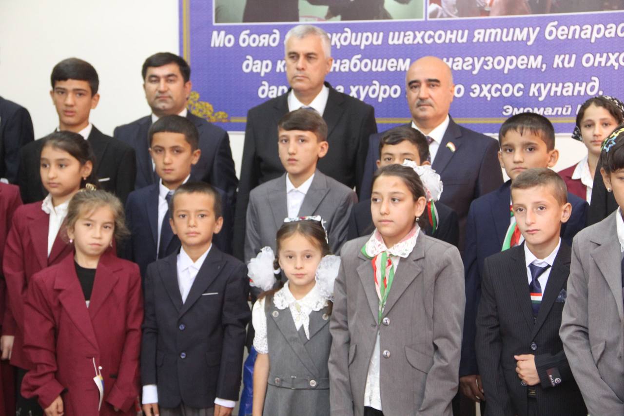 Presentation of school uniforms to orphans and children from low-income families